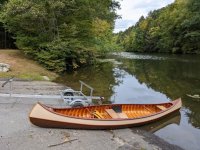 Slide canoe off trailer bars.jpg